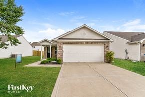 Avon house for rent - A house with a garage and a driveway is shown with the words "FirstKey Homes" on the bottom left.