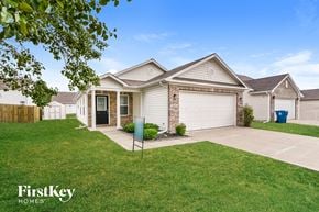 Avon house for rent - A house with a garage and a driveway is shown in the image.