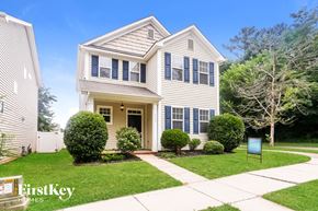Huntersville house for rent - A house with a sign that says "FirstKey Homes" in front of it.
