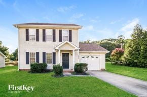 Charlotte house for rent - A two-story house with a garage is for sale by FirstKey Homes.