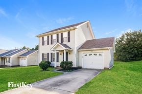 Charlotte house for rent - A two-story house with a garage is for sale by FirstKey Homes.