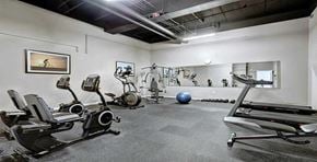 Lancaster apartment for rent - the gym is equipped with cardio equipment and weights
