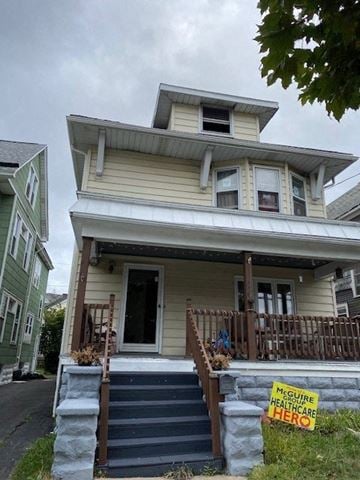 Buffalo apartment for rent - A house with a sign that says "Medicare Healthcare Hero".