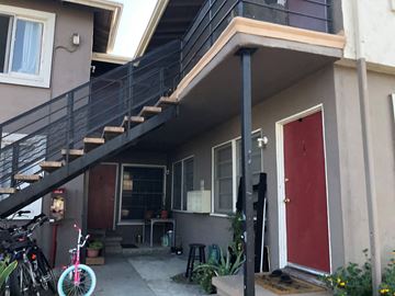 Winnetka apartment for rent - the outside of our house with our stairs and the red door