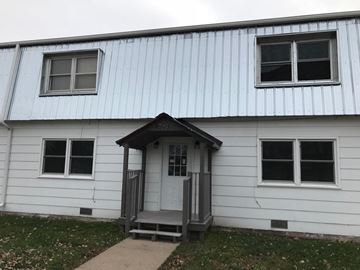 Fremont apartment for rent - the front door of a white house with a porch