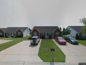 Rocky Mount apartment for rent - A white car is parked in front of a house.
