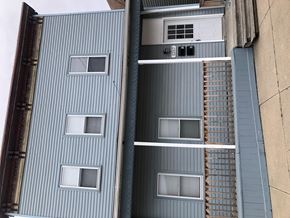 Omaha apartment for rent - the top of a blue building with windows