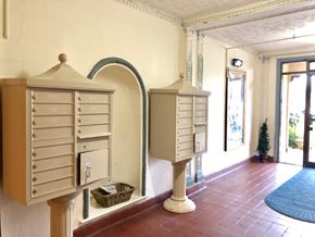 Alameda apartment for rent - A series of mailboxes are lined up on a wall.