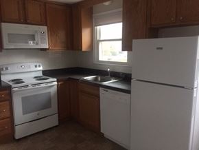 Foxboro apartment for rent - a kitchen with a stove refrigerator and a sink