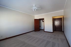 Alameda apartment for rent - A room with a carpeted floor and two doors.