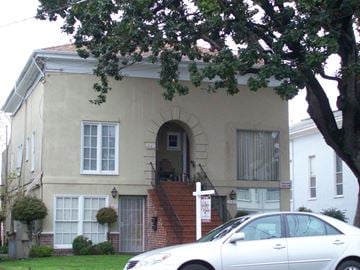 Alameda apartment for rent - a white car parked in front of a house
