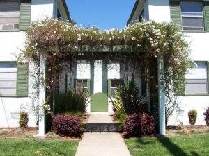 Alameda apartment for rent - a house with a covered porch and a sidewalk