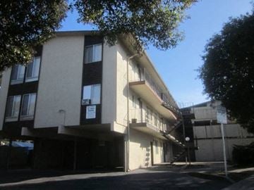 Hayward apartment for rent - a large building with a street in front of it