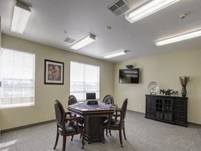 Brunswick apartment for rent - a conference room with a table and chairs and a tv