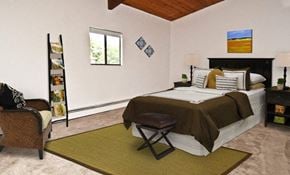 Foxboro apartment for rent - a bedroom with a bed and a chair