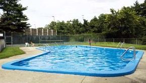 Nashua apartment for rent - a large blue swimming pool with people in it