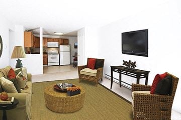 Keene apartment for rent - a living room with furniture and a television