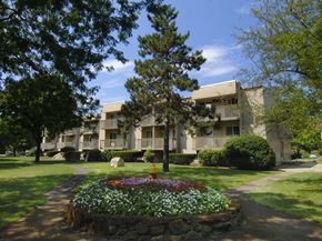 Mansfield apartment for rent - the view of a building with a garden in front of it