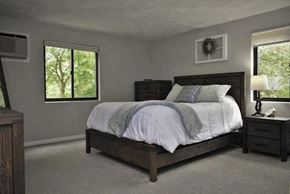 Foxboro apartment for rent - a bedroom with a bed and two windows