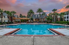 Jacksonville apartment for rent - A pool surrounded by a residential area with a "NO DIVING" sign.
