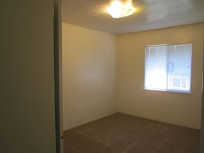 Alameda apartment for rent - A room with a window and a light on the ceiling.
