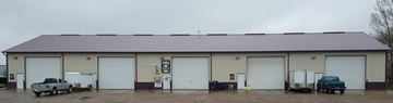 Hartford apartment for rent - A large building with a truck parked in front of it.