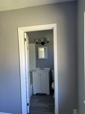 Cincinnati apartment for rent - A white bathroom with a toilet and sink.