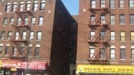 Bronx apartment for rent - a fire escape on the side of a building