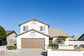 Glendale house for rent - a house with a garage door in front of it