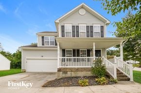 Kernersville house for rent - A two-story house with a garage and a front porch.