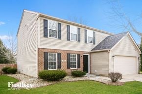 Avon house for rent - a white house with black shuttered windows and a lawn