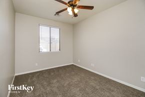 San Tan Valley house for rent - a bedroom with carpet and a ceiling fan