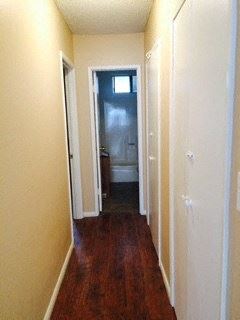 Northridge apartment for rent - a hallway with a door to a bathroom