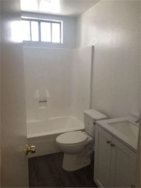 Northridge apartment for rent - a bathroom with a toilet and a tub and a sink