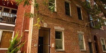 Philadelphia apartment for rent - a brick building with a door and windows