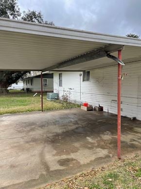 Eunice house for rent - a white house with a covered porch and a driveway