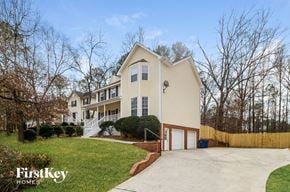 Alabaster house for rent - A house with a driveway and a garage is for sale.