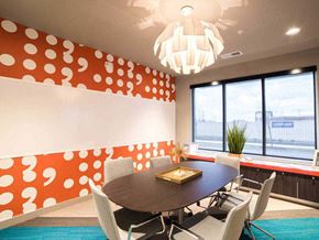 Miamisburg apartment for rent - a conference room with a table and chairs