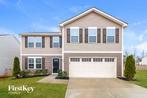 Clayton house for rent - A two-story house with a garage is for sale by FirstKey Homes.