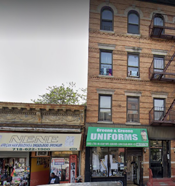 Brooklyn apartment for rent - A Greene & Greene Uniforms store is located in a brick building.