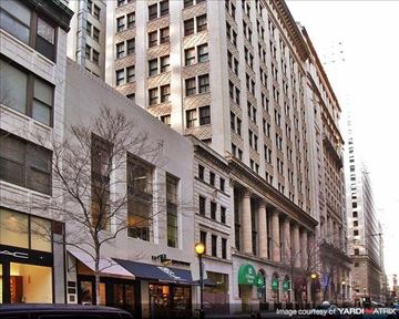 Philadelphia apartment for rent - a tall building on the corner of a city street