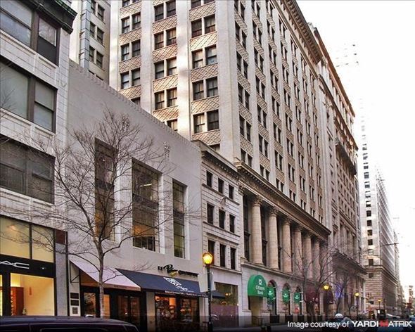 Philadelphia apartment for rent - a tall building on the corner of a city street