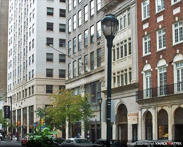 Philadelphia apartment for rent - a city street with a street light and tall buildings