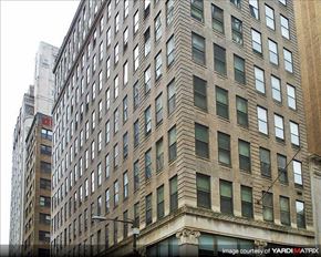 Philadelphia apartment for rent - a tall building with many windows on the side of it