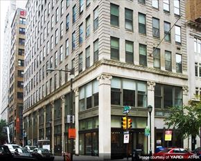 Philadelphia apartment for rent - a tall building on the corner of a city street
