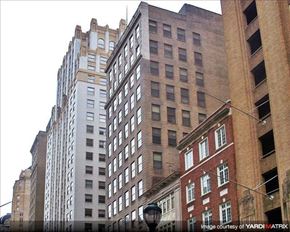 Philadelphia apartment for rent - a tall building in the middle of a city