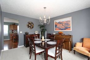 Morrow house for rent - a dining room with a table and a chandelier