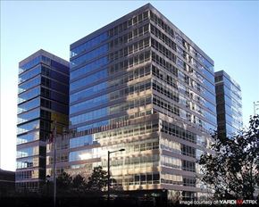 Philadelphia apartment for rent - a large glass building with a street lamp in front of it