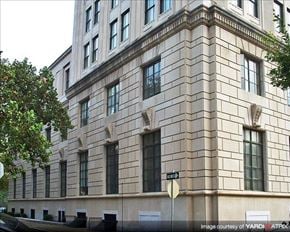Philadelphia apartment for rent - a large building with a street sign in front of it