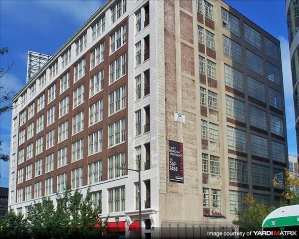Philadelphia apartment for rent - a large brick building with a sign on the side of it